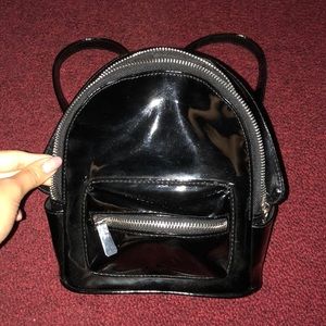Small black leather backpack